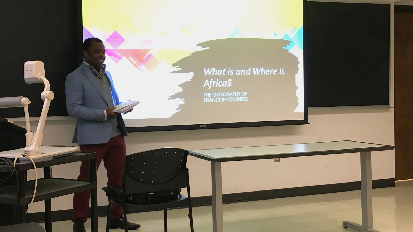 Eric Tsimi presenting during the 1st Annual Francophone Day