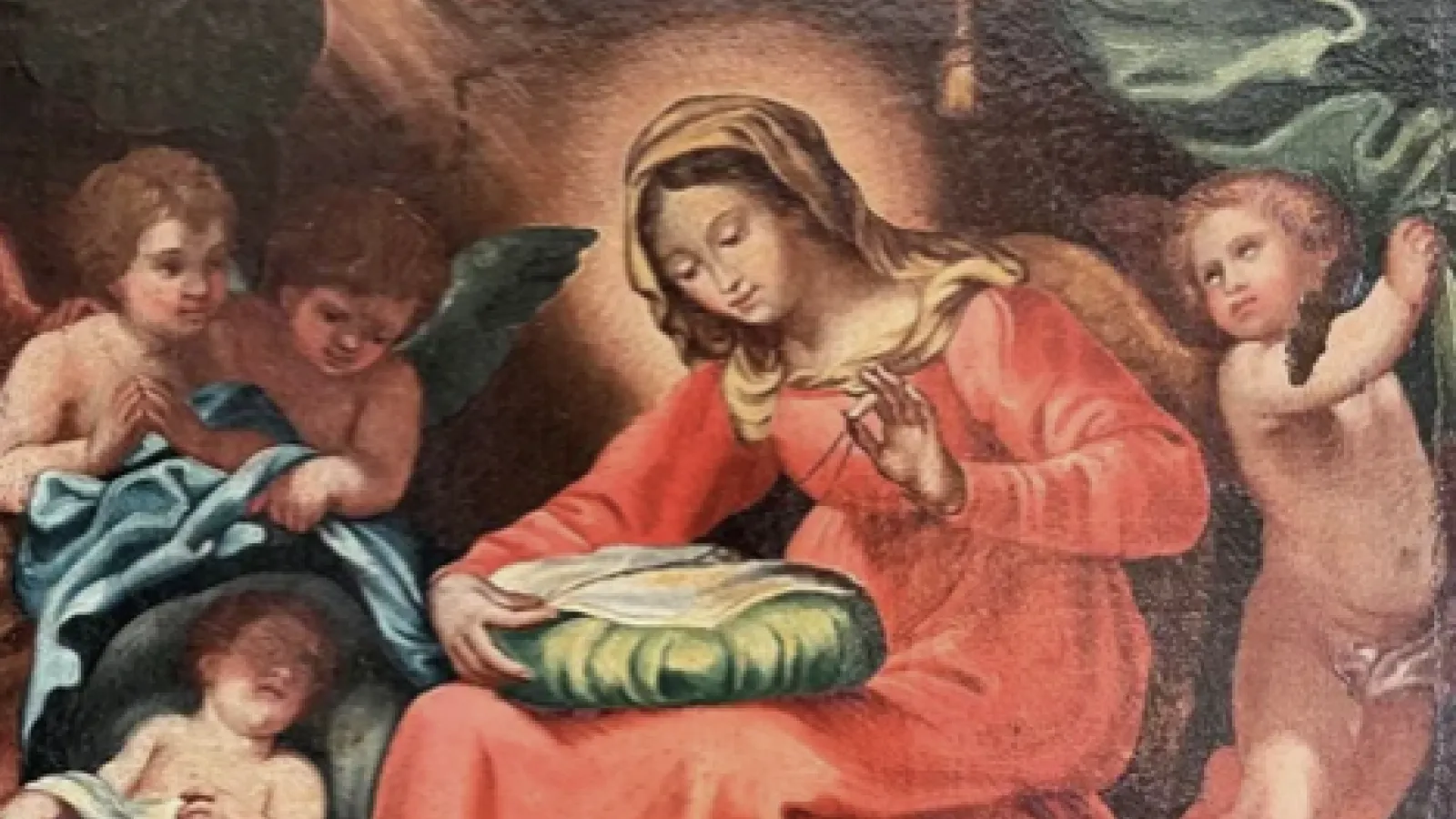 Painting of woman with baby surrounded by angels