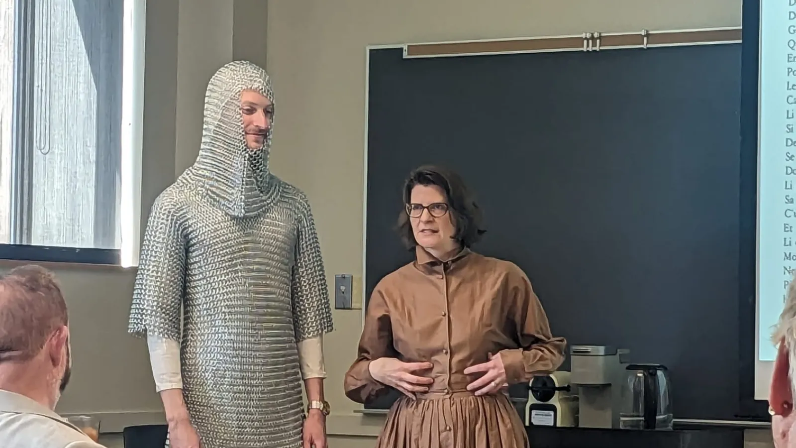 Sarah-Grace Heller and student in chain mail