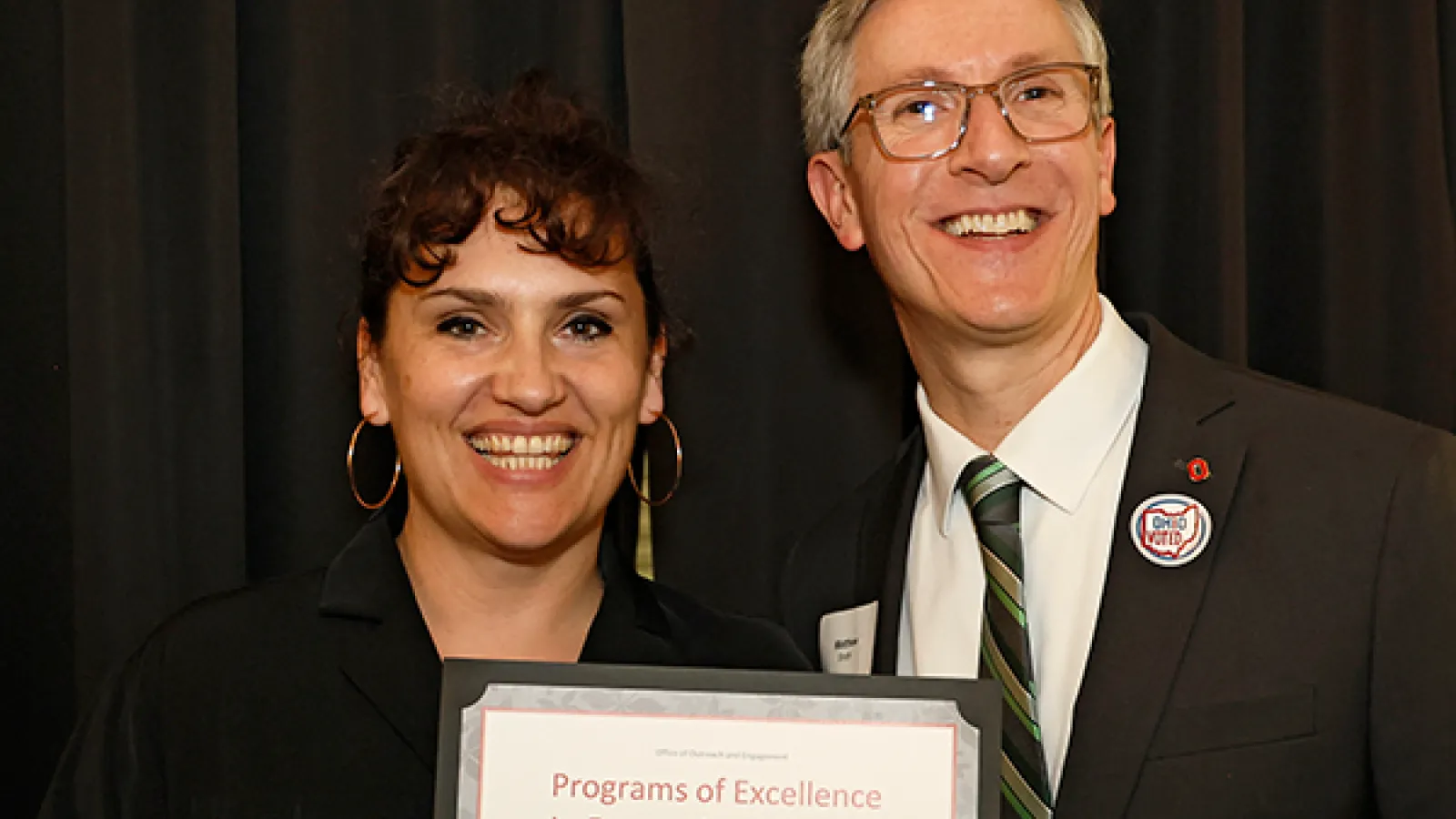 professor lucille toth receiving the award