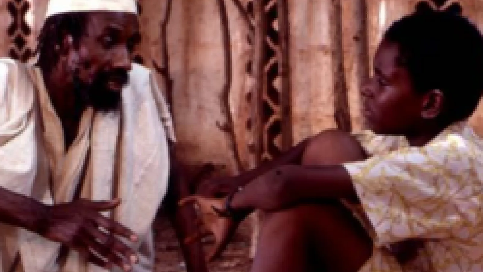 Griot teaching younger Keita (image from the film)