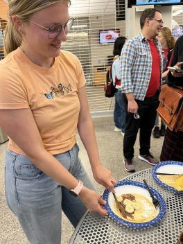 Club member showing off their crepe