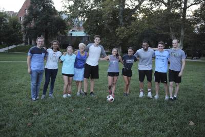 Janice Aski (fourth from left) and Benjamin Hoffmann (right) with students who stayed to play soccer