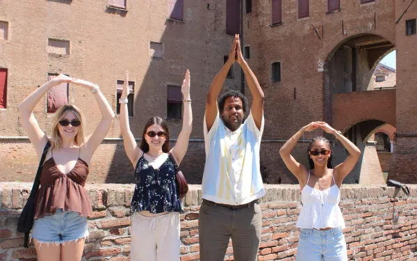 Students spelling O-H-I-O in Italy