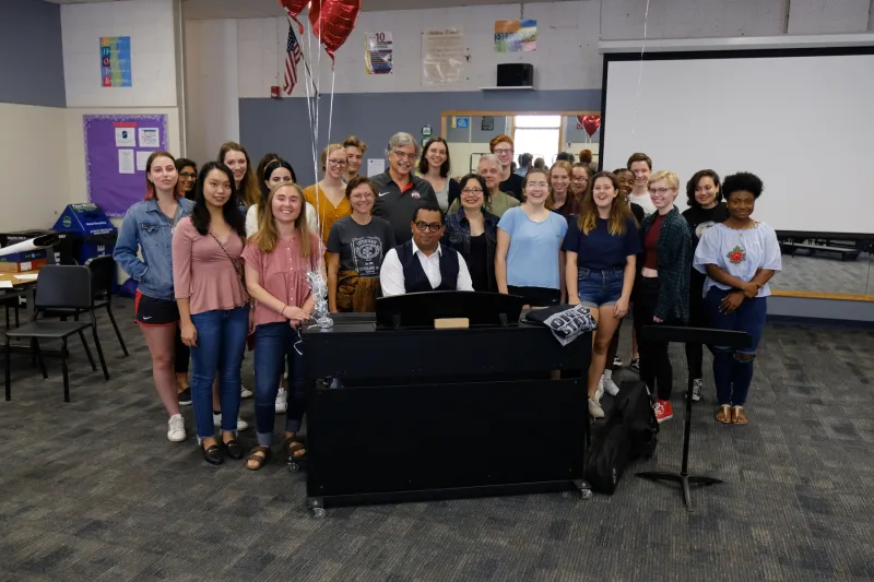Charles with students
