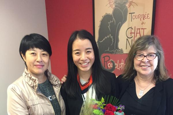 Xinyi Tan (middle) with her mother (left) and advisor Professor Danielle Marx-Scouras (right)