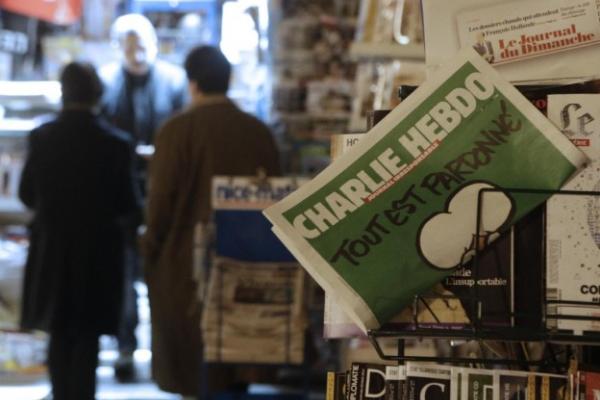 Charlie Hebdo Image Photo of Charlie Hebdo in magazine rack