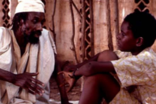 Griot teaching younger Keita (image from the film)