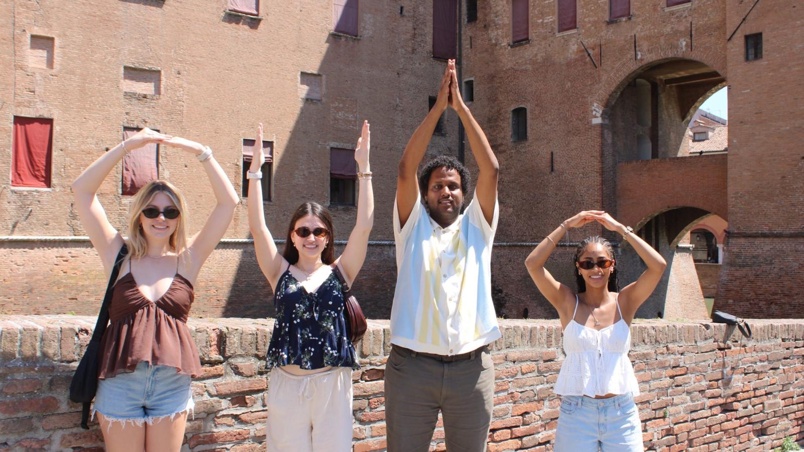 Students spelling O-H-I-O in Italy